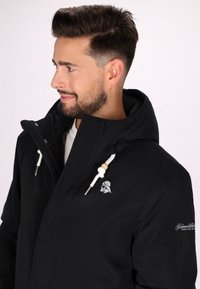 Schmuddelwedda Cappotto invernale - schwarz