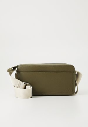REMYY UNISEX - Cross body bag - medium green