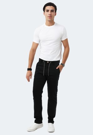 Trousers - schwarz