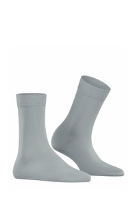 Gray crew socks made of smooth fabric, featuring a ribbed cuff and a seamless toe design. Simple, uniform color with no patterns or accents.