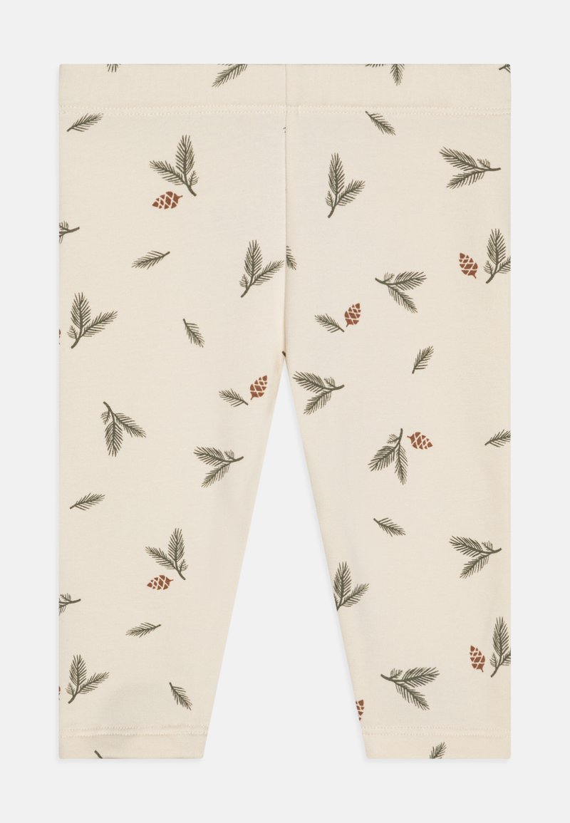 Cremefargede leggings med et heltrykk av grønne furugreiner og brune furukongler, laget av myk og elastisk stoff.