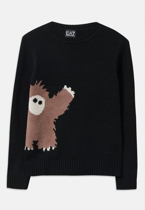 Maglione nero lavorato a maglia con un personaggio marrone e accenti bianchi sul davanti, colletto tondo e polsini e orlo a costine.