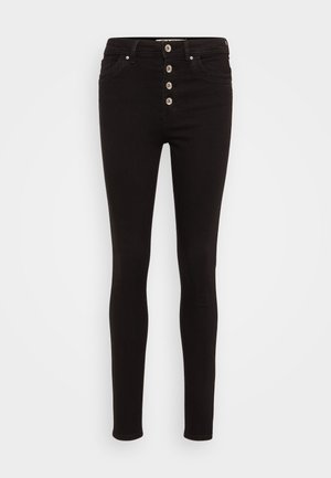 Calças jeans skinny pretas feitas de denim, com uma cintura alta, cinco bolsos e um fecho frontal de cinco botões. Textura suave e design ajustado.