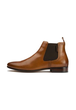 Brown leather Chelsea boot with elastic side panels, smooth texture, and decorative stitching. Features a pull tab at the heel and low-stack heel.