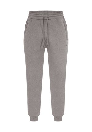 Pantalon de survêtement gris en tissu doux, avec une taille élastique à cordon de serrage, des poches latérales et des poignets côtelés aux chevilles.