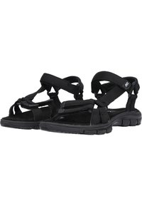 Black sandals made of fabric and rubber, featuring adjustable straps, a knotted design on the front, and a textured, cushioned sole.