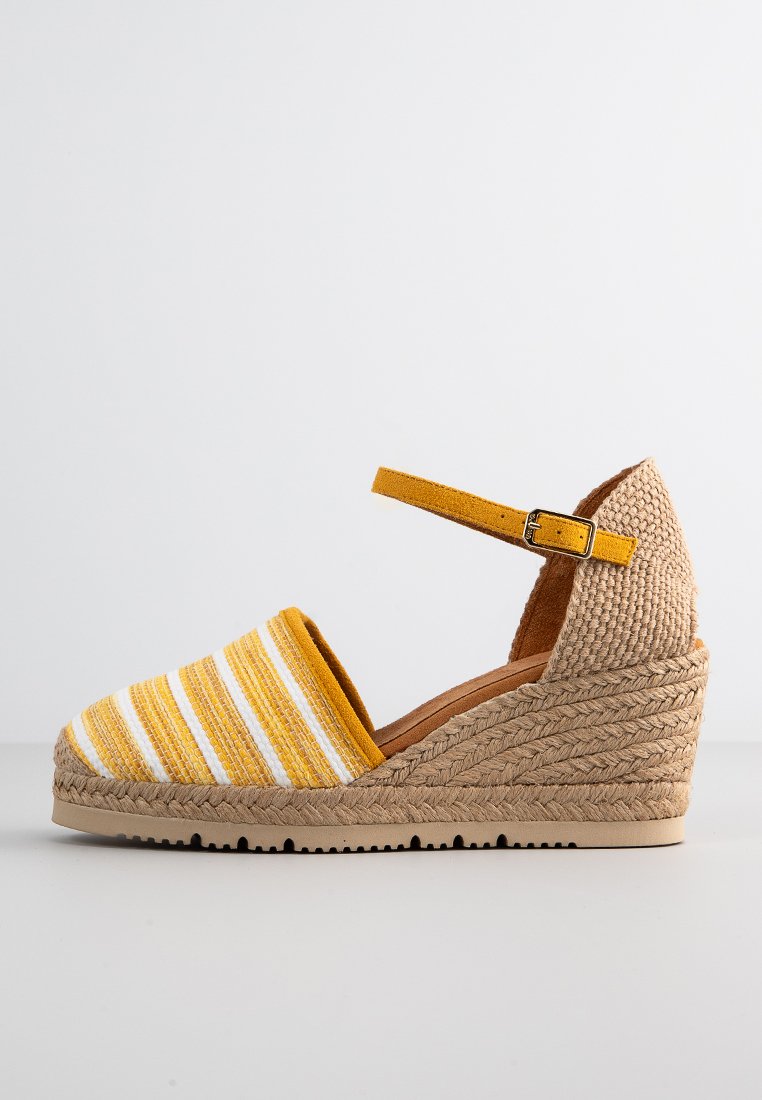 Unisa Sleehakken geel Unisa Sleehakken geel