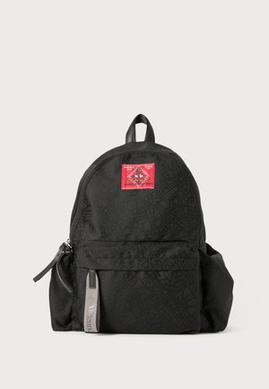 Black backpack with embossed pattern, red logo patch, zippered front pocket, and gray strap detailing. Durable fabric and rounded shape.