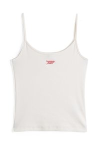 Débardeur à fines bretelles blanc côtelé avec logo "tommy jeans" brodé au centre de la poitrine en rouge.
