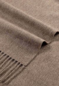 Brown wool scarf with a soft texture, featuring rolled edges and fringe at one end, displayed in a folded arrangement.