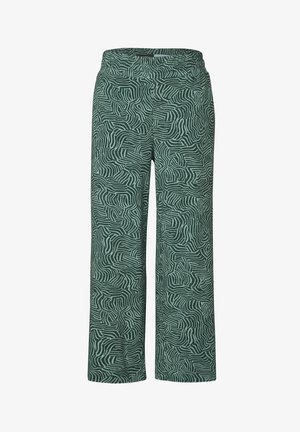 Green wide-leg pants made of soft fabric featuring a textured, abstract white line pattern throughout. Elastic waistband for comfort.