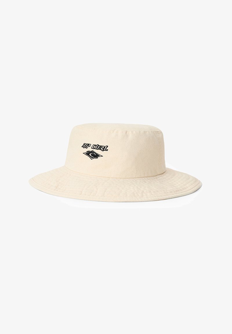 Beige buckethoed met brede rand en zwart "Rip Curl" logo geborduurd in het midden van de voorkant.