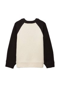 Pull-over en laine avec un corps crème et des manches raglan noires. Fabriqué en matériau tricoté doux, avec un ourlet et des poignets côtelés.