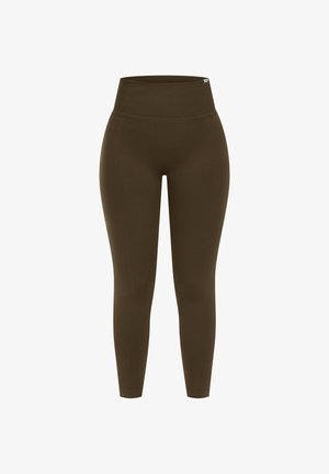 Høj talje leggings i mørke olivengrøn, lavet af glat, strækbart stof. Har et sømløst design og en tætsiddende silhuet.