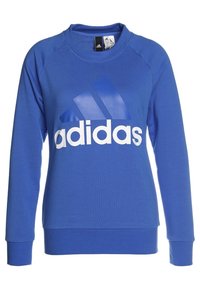 Sudadera azul con textura acanalada, que presenta un gran logo blanco de "adidas" y tres rayas azules en el frente. Cuello redondo y mangas largas.