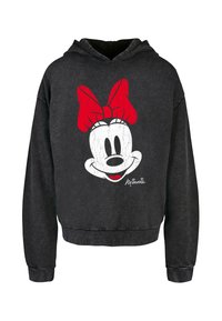 Fekete kapucnis pulóver, melyen egy rajzfilmfigura arca látható nagy grafikával, piros masnival, fehér arcvonásokkal és egy aláírással.