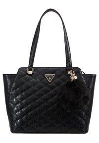 Sac fourre-tout en similicuir noir avec texture matelassée, plaque logo bien visible, et un pompon amovible en fourrure noire. Equipé de poignées robustes.