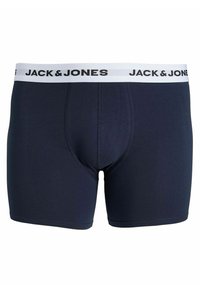 Navyblå kalsonger tillverkade av mjukt tyg, med ett vitt midjeband där "JACK & JONES" är tryckt i svart, designade för komfort och passform.