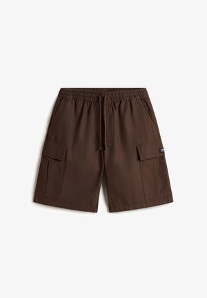 Pantaloni cargo marroni realizzati in tessuto resistente. Presentano una vita elastica, cordoncino e numerose tasche laterali per riporre oggetti.