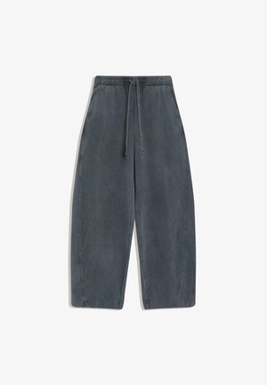 Šedé nohavice s širokými nohavicami z mäkkej, textúrovanej látky. Majú elastický pás so sťahovacou šnúrkou a postranné švy s vreckami.