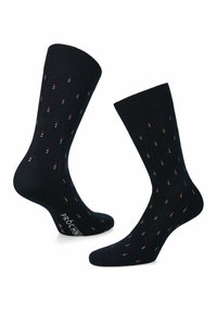 Czarne skarpetki o tkanym wzorze, z motywem małych czerwonych i białych kropek. Długość do połowy łydki z wzmocnionym ściągaczem i palcami.