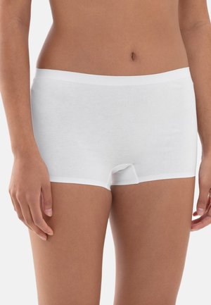 White cotton-like material boyshorts with a soft waistband, seamless design, and a mid-thigh length. Smooth texture and minimal stitching details.