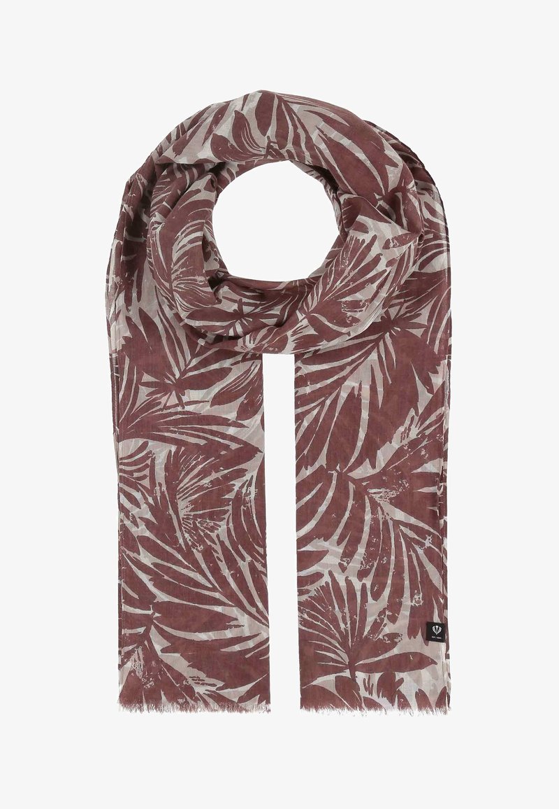 Foulard en tissu léger avec motif de feuilles tropicales rouge foncé, en boucle lâche avec des bords frangés et une petite étiquette de marque noire.