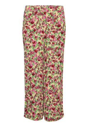 Lille kollane taust, millel on roosa ja roheline lillemuster, sirge lõikega ning küljetaskudega lillelised püksid.