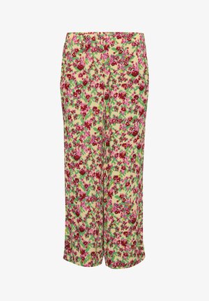 Lille kollane taust, millel on roosa ja roheline lillemuster, sirge lõikega ning küljetaskudega lillelised püksid.