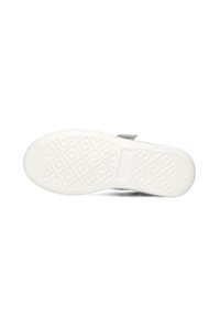 White sneaker sole featuring a textured rubber surface with a diamond pattern, flat heel, and a small fabric accent on the side.