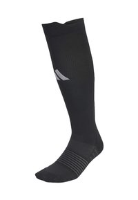 Mustat polven ylle ulottuvat kompressiosukat, joissa on uritetut kuviot ja pieni valkoinen logo pohkeessa.