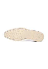 Rubberen schoenzool in off-white, met cirkelvormige grip patronen, een langwerpige vorm en contrasterend blauwe stiksels langs de rand.