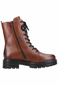 Bottine en cuir marron avec un bout rond, des détails de fermeture éclair, un laçage à l'avant, des accents noirs et une semelle robuste pour une meilleure adhérence.