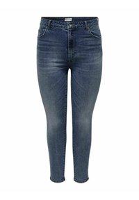 Vaqueros ajustados de corte skinny, lavado medio, diseño de cinco bolsillos, con cremallera y cierre de botón; el material tiene un ligero estiramiento y una textura suave.