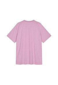 Īsām piedurknēm, ar apļveida izgriezumu, t-krekls viegla rozā krāsā no kokvilnas. Vienkārša dizaina ar brīvu piegriezumu un bez redzamām zīmola vai rakstu elementiem.