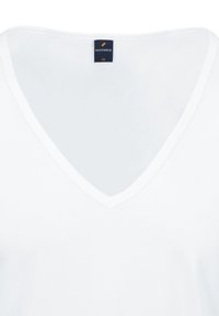 White V-neck T-shirt with a black and orange size tag labeled "Suitable M" at the neckline.