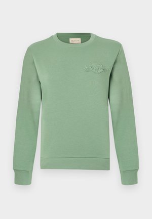 Világoszöld, pamut anyagból készült pulóver, bordázott nyakkal és mandzsettával, hímzett logó részlettel a mellrészen.