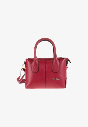 Red leather handbag with two short handles, a removable shoulder strap, and a zip closure. Features textured surface and gold logo accent.