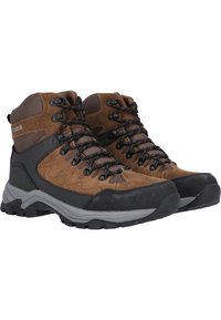 Bruine wandelschoenen met een bovenwerk van suede, mesh accenten, een zwarte rubberen neuskap en een dikke grijze zool met een gestructureerd profiel.