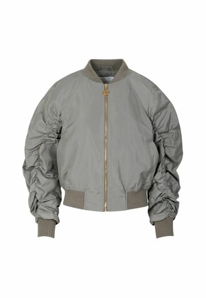 Pilka bombonešio striukė su priekinės dalies užtrauktuku, rauktomis rankovių detalėmis, ribotomis rankogaliais ir apačia, apvali kaklo linija. Auksinės spalvos detales.