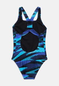 One-piece swimsuit featuring a blue and black abstract pattern, with a racerback and cutout design. Made of stretchy swim fabric.