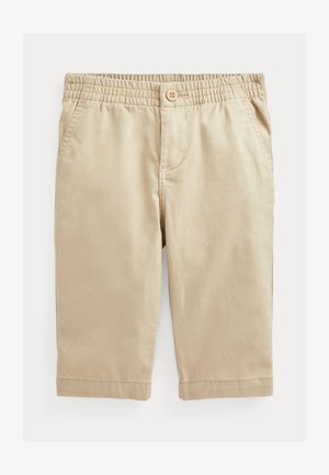 Pantalones cortos de algodón beige con cintura elástica, cierre de botón, bolsillos frontales y corte recto hasta la rodilla. Sin patrones o acentos visibles.