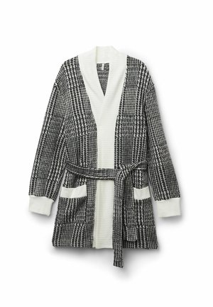 Cardigan a righe in bianco e nero con colletto a scialle, maniche lunghe, due tasche frontali e una cintura in vita. Dettagli in texture a costine.