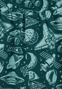 Zeleno blago z vesoljskim motivom, na katerem so rakete, planeti in zvezde v svetlo modri barvi. Elastični pas za udobje.