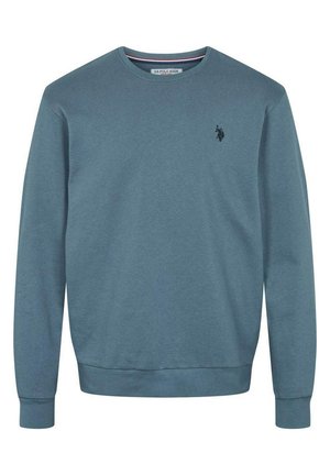 Męska niebieska bluza z długim rękawem, okrągłym dekoltem, ściągaczami przy mankietach i na dole, z małym czarnym logo US Polo Assn. na lewej piersi.