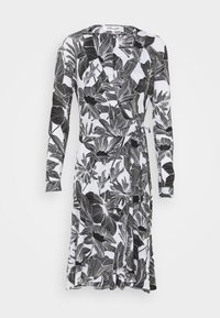Robe portefeuille à manches longues avec un grand imprimé floral noir et blanc et une ceinture à nouer à la taille.