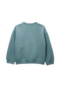 Sweatshirt matelassé teal avec un col rond, des manches longues et des poignets côtelés. Un motif de losanges texturé recouvre le tissu.