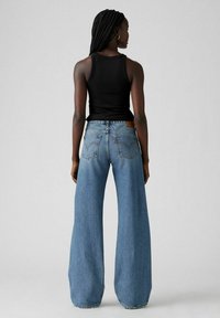 Levi's® GOOD GRADES - Vaqueros a campana - boss business