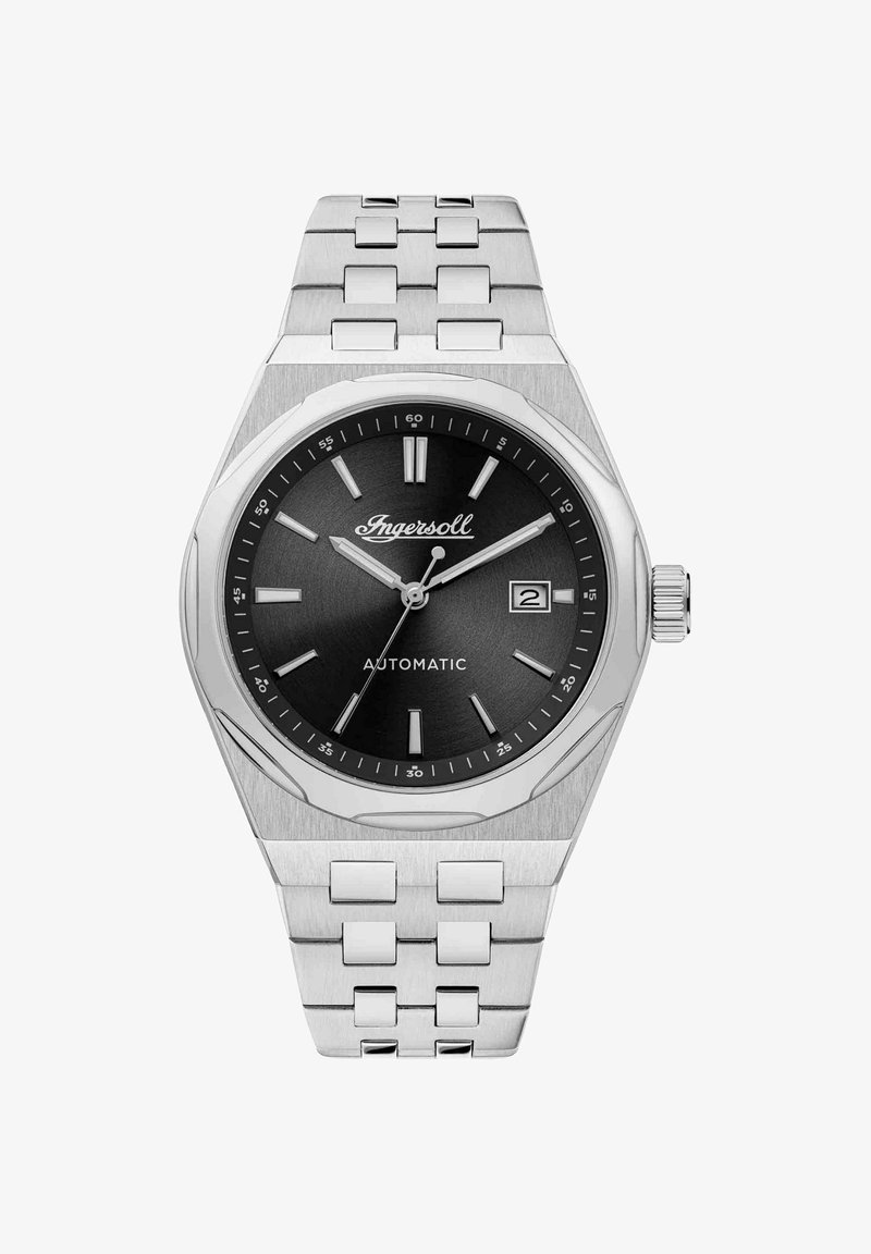 Montre automatique en acier inoxydable avec un cadran circulaire noir, des marqueurs d'heure argentés et une fonction date, dotée d'un design élégant de bracelet à maillons.