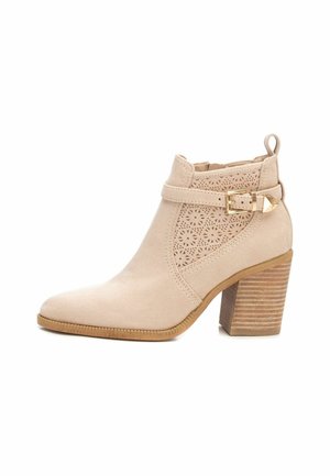 Botines camperos - beige